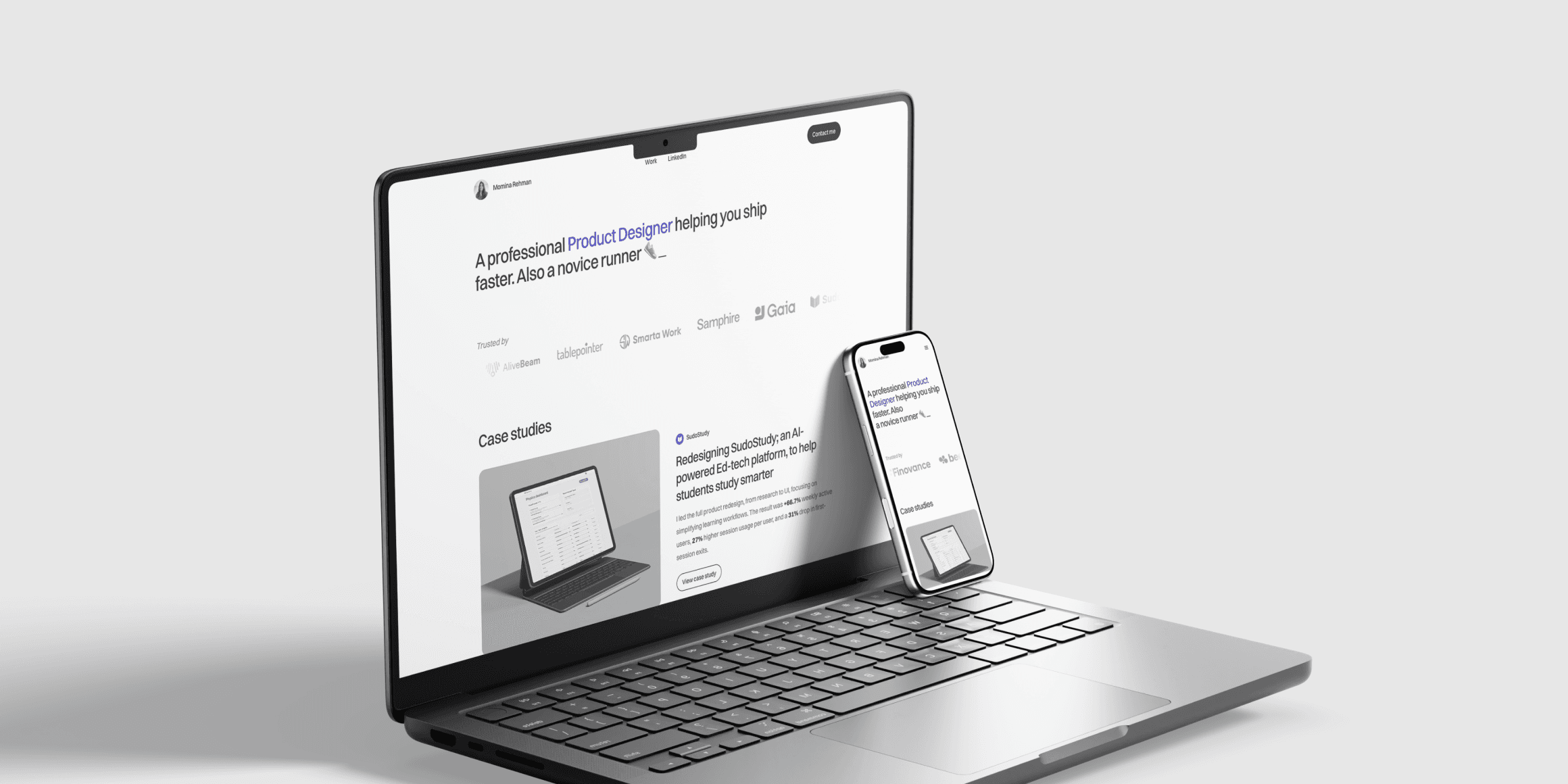 Portfolio website shown on laptop and phone mockups